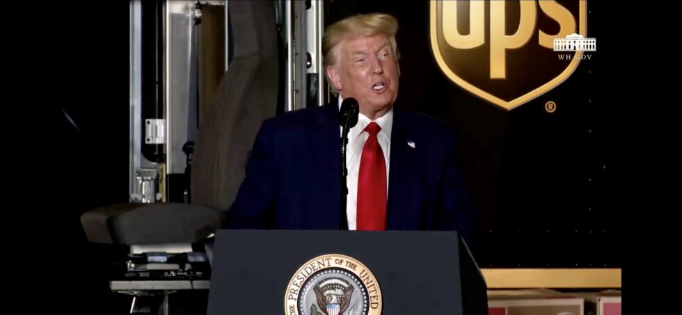 President Donald Trump at a podium