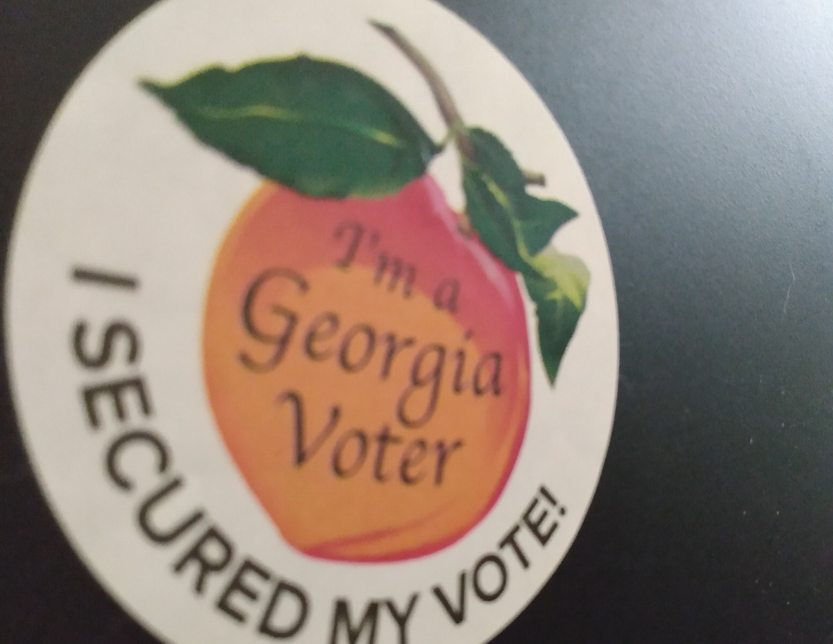 Georgia peach voting sticker that says I secured my vote