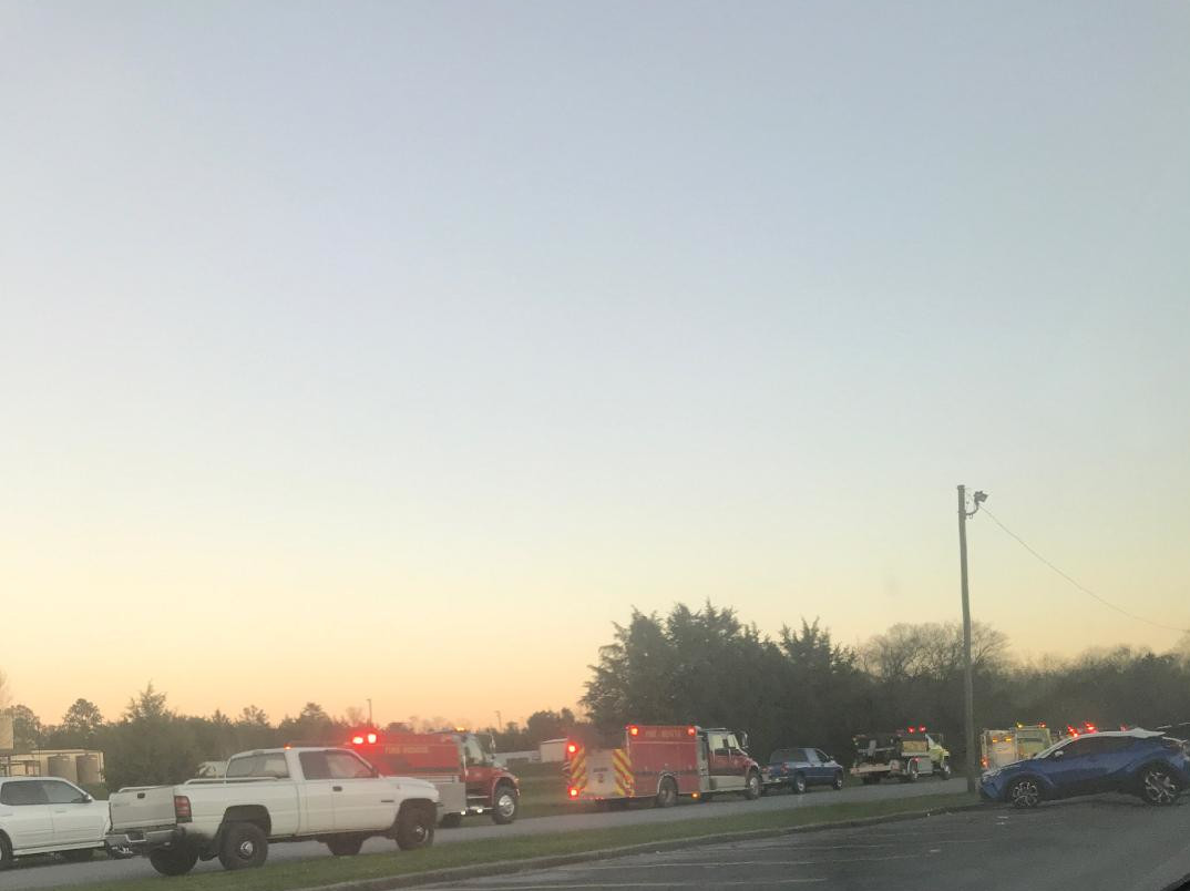 fire trucks lined up along the road