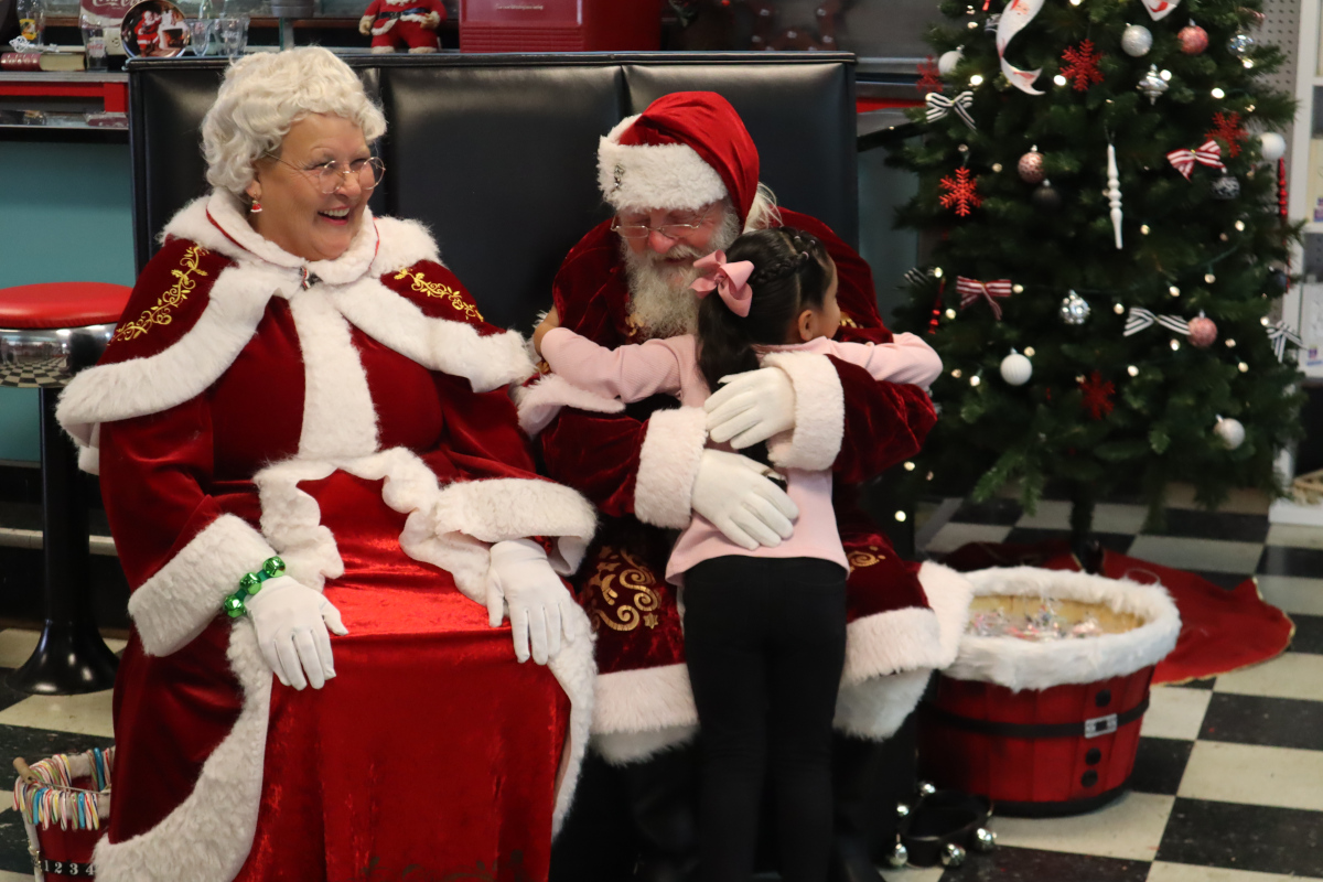 Santa and mrs. claus visit remix at moores